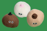 Three plush breasts in different colors
