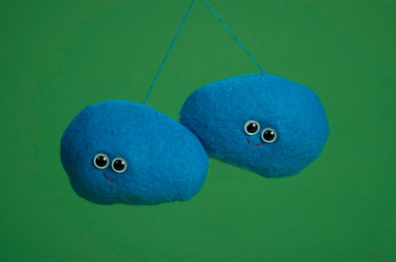 Two blue plush testicles
